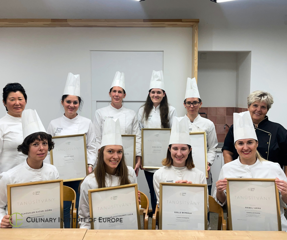 Students receive their certificate at CIE